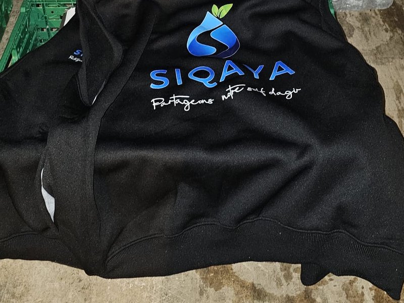 Préparation de colis alimentaires — gilet SIQAYA